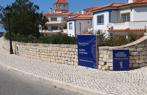 Praia del Rei Apartment | Stylish Apartment with Shared Pool and Oceanfront Views