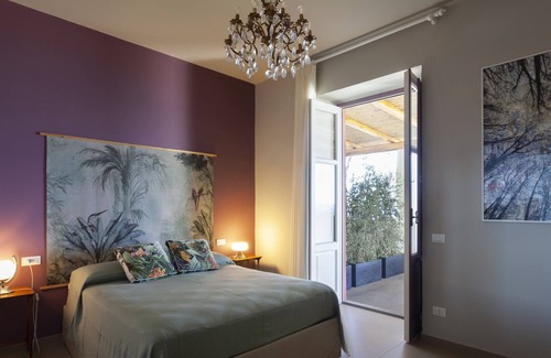 Malfa Apartment | Apartment with spacious terrace overlooking the sea in a villa with swimming pool and garden