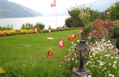 Faulensee Apartment | Exclusive Apartment with Terrace & Breathtaking Lake Views
