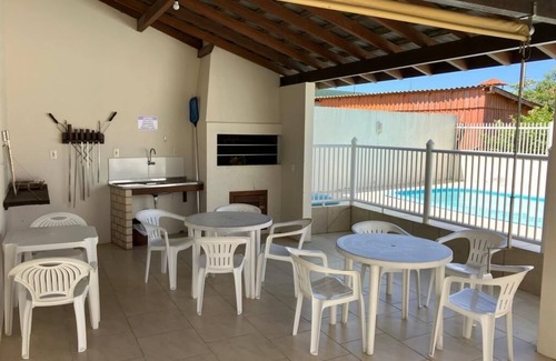 Barra de Ibiraquera Apartment | Apartment with two suites, two blocks from the sea and three from the lagoon.