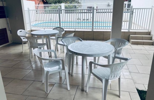 Barra de Ibiraquera Apartment | Apartment with two suites, two blocks from the sea and three from the lagoon.
