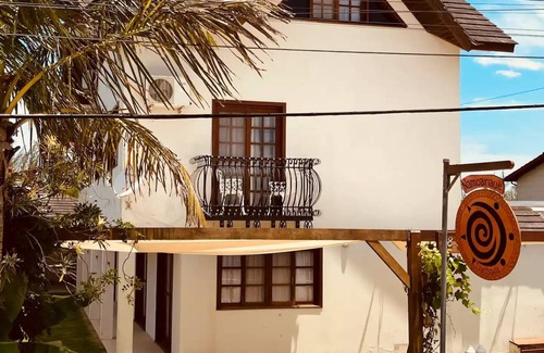 Barra de Ibiraquera Apartment | Apartment with two suites, two blocks from the sea and three from the lagoon.