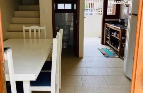 Barra de Ibiraquera Apartment | Apartment with two suites, two blocks from the sea and three from the lagoon.
