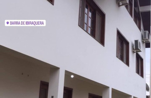 Barra de Ibiraquera Apartment | Apartment with two suites, two blocks from the sea and three from the lagoon.