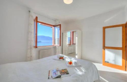 Laveno Apartment | Scenic Apartment Overlooking Lake Maggiore in Laveno Mombello