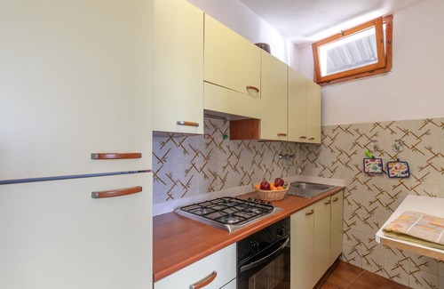 Campo nell'Elba Apartment | Sea View Apartment with Wi-Fi & Pet-Friendly Amenities