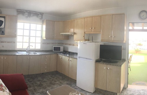 Tarajalejo Apartment | Cozy Apartment with WiFi and Kitchen for Your Getaway