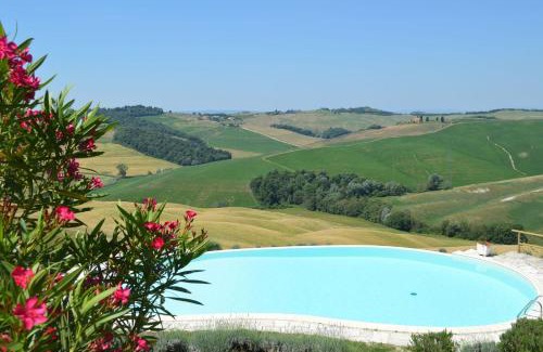 Torre A Castello Apartment | Scenic Apartment Overlooking the Serene Crete Senesi