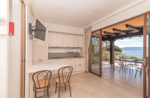 Capo d'Orso Apartment | Beachside Apartment 'Z2 20 Cala Capra' with Pool & Wi-Fi