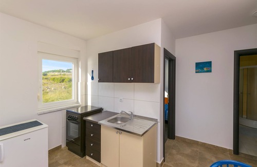 Vlasici Apartment | Guest Rated: Beachfront Apartments Ante on Island Pag