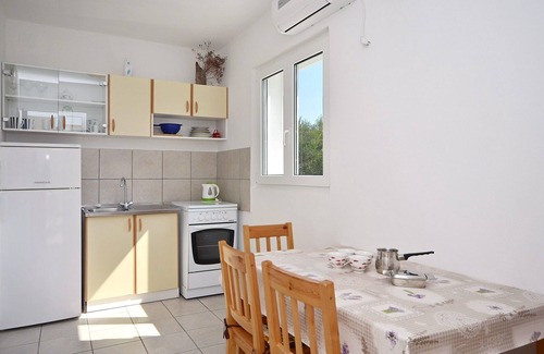 Tribunj Apartment | Discover Apartments Mila: Oceanfront Oasis with Pool
