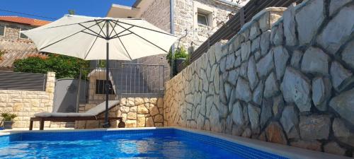 Cove Donja Krusica (Donje selo) Apartment | Perfect Getaway at Apartments Tomina with Oceanfront Views