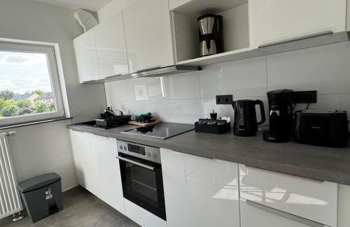 Schonnebeck Apartment | Comfortable Stay at Aparts House with WiFi & Kitchen