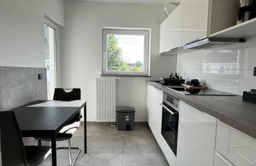Schonnebeck Apartment | Comfortable Stay at Aparts House with WiFi & Kitchen