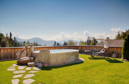 Soprabolzano Hotel | Experience APIPURA Hotel: Oceanfront Bliss with Spa Access
