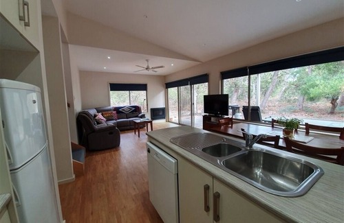 Forge Creek Apartment | Experience Waterfront Relaxation at Apollo Hotel