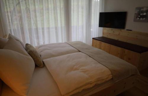Maria Alm am Steinernen Meer Apartment | Cozy Apartment with Balcony and Pool Near the Ocean