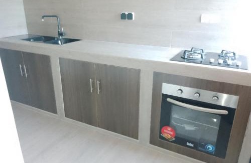 Littoral Department Apartment | Child-Friendly Retreat at Appart'Confort for Your Family