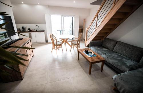 Saint-Guenole Apartment | Panoramic Ocean View Duplex with Pool & Balcony Escape