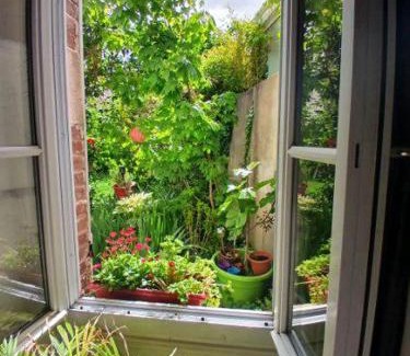 Faubourg Sud Apartment | Family-Friendly Appart Rez de jardin with High Guest Ratings