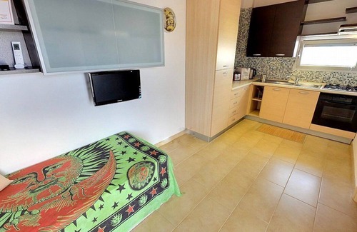 Punta Secca House | Odisseo C: Beachside Apartment with Free Wi-Fi & Breakfast