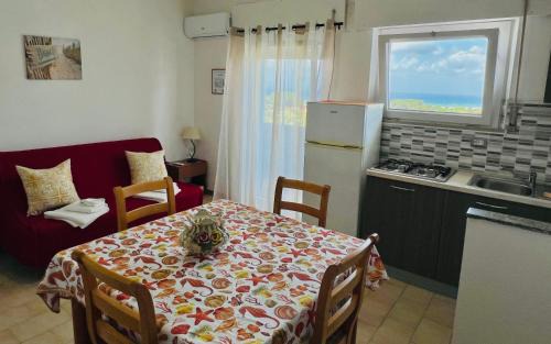 La Muddizza Apartment | Inviting Appartamenti Abbaidda 3 with Oceanfront Views