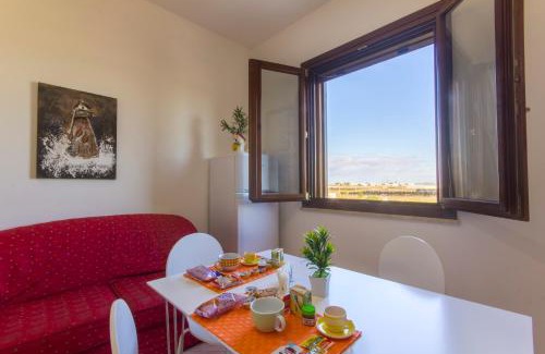 Birgi Vecchi Apartment | Family-Friendly Appartamenti Elios with Cozy Fireplace