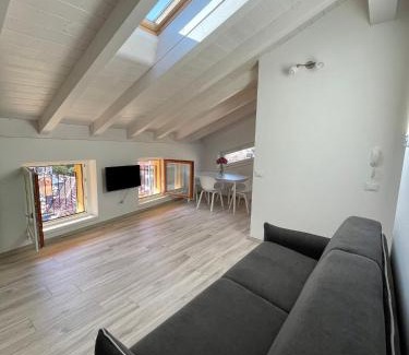 Torbole sul Garda Apartment | Cozy Appartamenti Le Tre Rose with Ocean Views & More