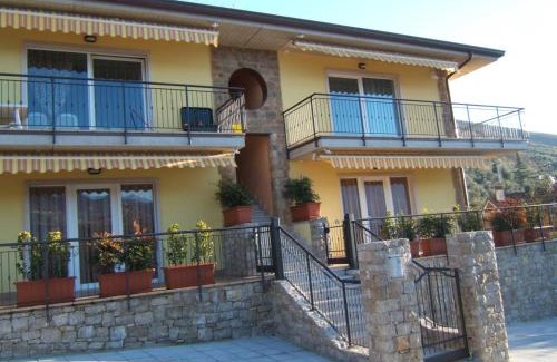 Magugnago Apartment | Appartamenti Mary: Top-Rated Stay with Ocean Views