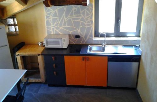 Burano Apartment | Top-Rated Appartamenti Montemezzo: Family-Friendly Retreat