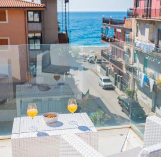 Mazzeo Apartment | Inviting Paolone House: Private Beach & Oceanfront Views
