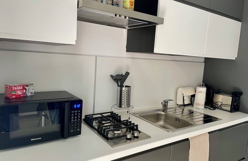 Arona Apartment | Convenient Getaway Just 900 Meters from Lake Maggiore