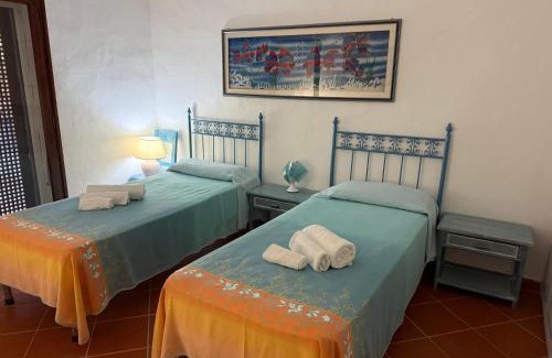 Baia Caddinas Apartment | Discover Appartamento Baia Caddinas: 4-Star Family Retreat