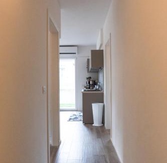 Riva del Garda Apartment | Inviting Campagnola Apartment with Private Garden & Pool