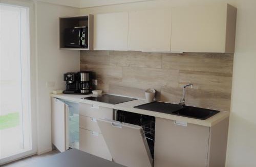 Riva del Garda Apartment | Inviting Campagnola Apartment with Private Garden & Pool