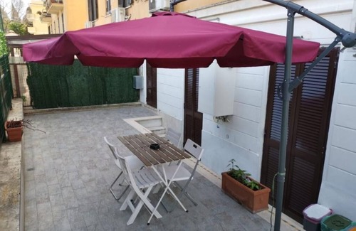 Quartiere XXVII Primavalle Apartment | Cozy Apartment with Garden and Parking near Gemelli Cristo Re