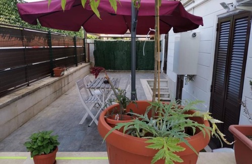 Quartiere XXVII Primavalle Apartment | Cozy Apartment with Garden and Parking near Gemelli Cristo Re