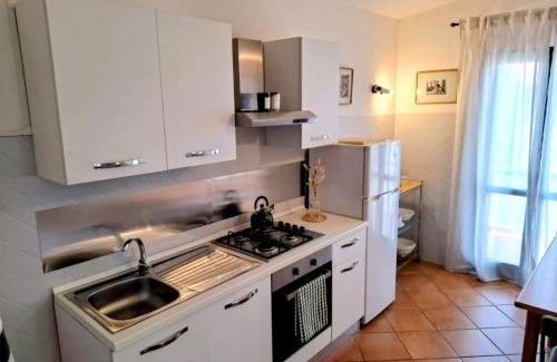 Porto Pollo Apartment | Oceanfront Retreat: Appartamento in villa Porto Pollo
