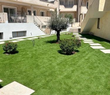 Palau Apartment | Inviting Apartment with Pool and High Guest Ratings