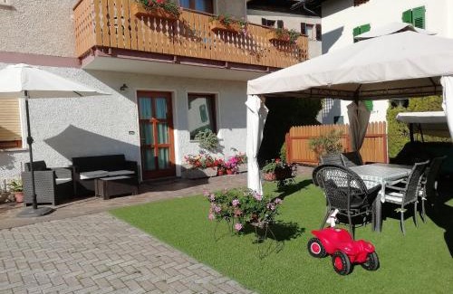Coredo Apartment | Charming Appartamento "Laghet" with Garden & Family Amenities