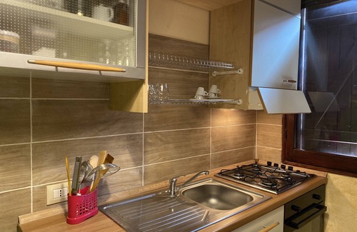 Portoscuso Condo | Relax at Appartamento Lucia with Spa and Family-Friendly Amenities