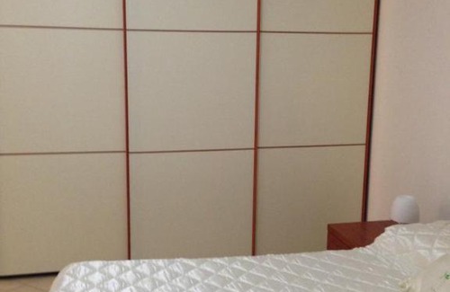 Carbonia Apartment | Discover Appartamento Margherita: Rated 9/10 & Family-Friendly