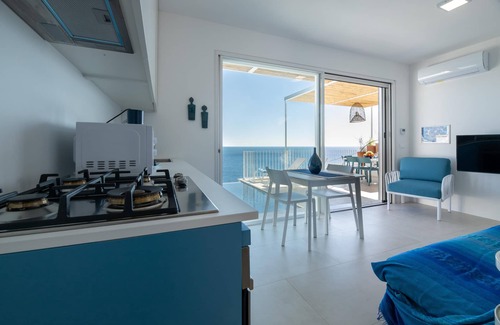 Castro Marina Apartment | Relax at Appartamento Marinaia Up with Ocean Views & Pool