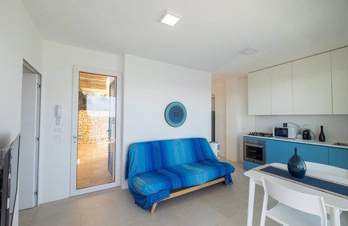 Castro Marina Apartment | Relax at Appartamento Marinaia Up with Ocean Views & Pool