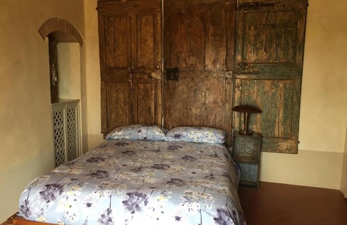 San Pietro in Bossolo Apartment | Cozy Casa di Carla: Guest Rated 9/10 with Kitchen Amenities