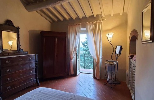 San Pietro in Bossolo Apartment | Cozy Casa di Carla: Guest Rated 9/10 with Kitchen Amenities