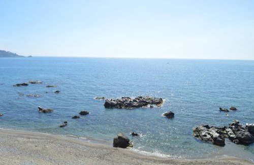 Giardini Naxos Apartment | Beachfront Escape at Appartamento Teocle - Rated 9.5/10