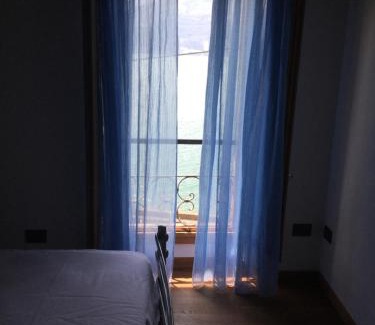 Monte Isola Apartment | Discover Appartamento Terrazza sul Porto with Ocean Views