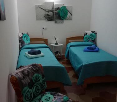 Bosa Historic Centre Apartment | Family-Friendly Le Rose: Rated 9/10 for Memorable Stays