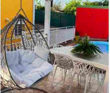 Les Abymes Apartment | Guest Rated 10/10: Cozy Les Abymes Apartment with Pool